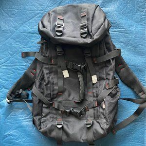 KAKA Large Men's Hiking Black Backpack with lid, hip belt, lots of pockets